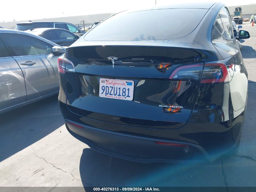 2023 Tesla Model Y Awd/Long Range Dual Motor All-Wheel Drive VIN: 7SAYGDEE1PA033207 Lot: 40276313