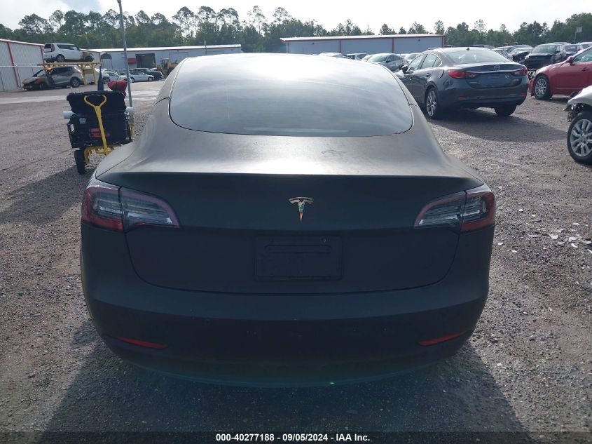 2021 Tesla Model 3 Standard Range Plus Rear-Wheel Drive VIN: 5YJ3E1EA5MF987787 Lot: 40277188