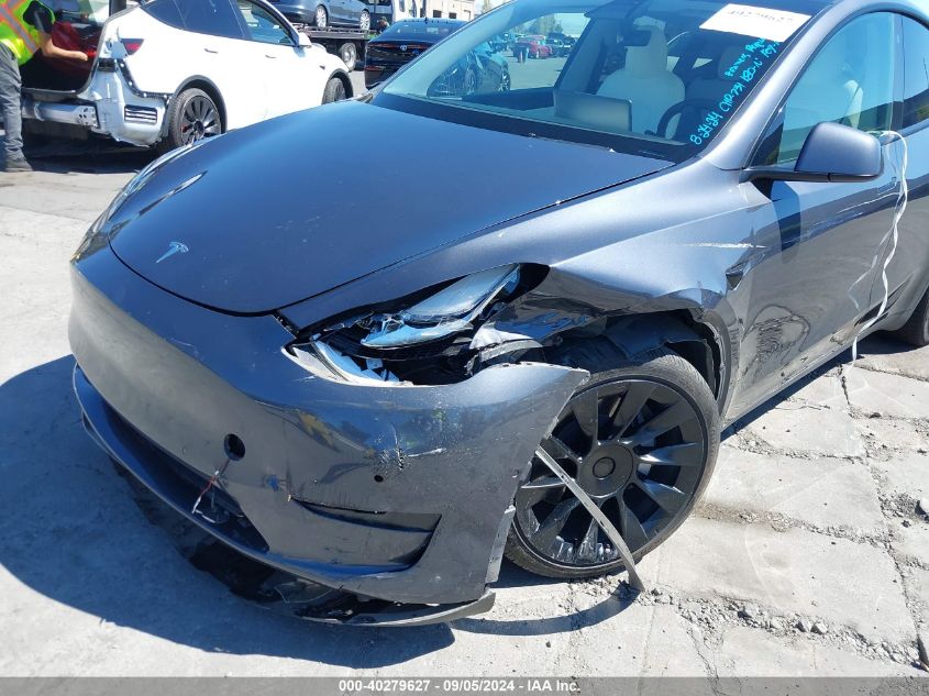 2022 Tesla Model Y Long Range Dual Motor All-Wheel Drive VIN: 7SAYGDEE4NF462065 Lot: 40279627