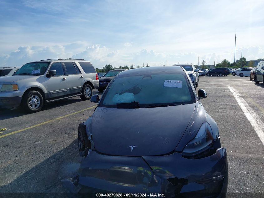 2023 Tesla Model 3 VIN: 5YJ3E1EA3PF398631 Lot: 40279828