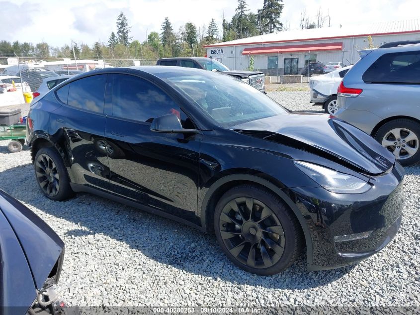 2023 Tesla Model Y Awd/Long Range Dual Motor All-Wheel Drive VIN: 7SAYGDEEXPF816495 Lot: 40280253