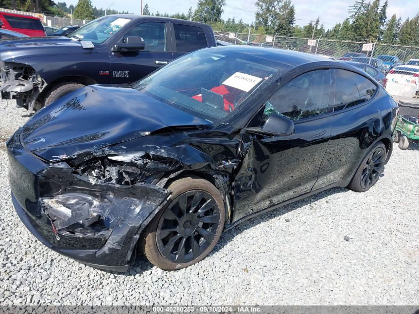 2023 Tesla Model Y Awd/Long Range Dual Motor All-Wheel Drive VIN: 7SAYGDEEXPF816495 Lot: 40280253