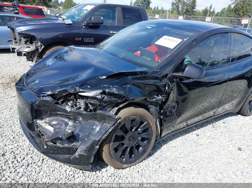 2023 Tesla Model Y Awd/Long Range Dual Motor All-Wheel Drive VIN: 7SAYGDEEXPF816495 Lot: 40280253