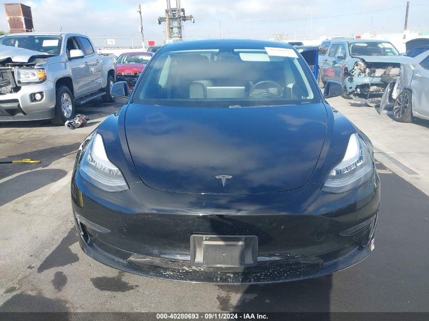 2019 Tesla Model 3 VIN: 5YJ3E1EB8KF194697 Lot: 40280693