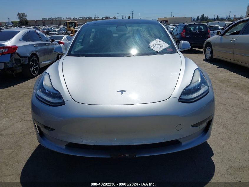 2018 Tesla Model 3 Long Range/Mid Range VIN: 5YJ3E1EA0JF048476 Lot: 40282238