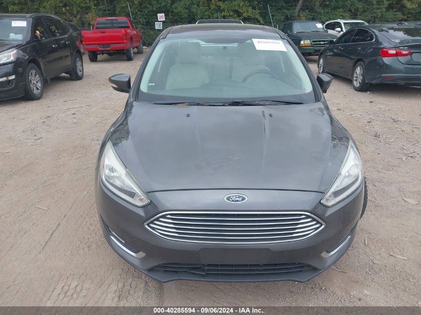 2015 Ford Focus Titanium VIN: 1FADP3J24FL322555 Lot: 40285594