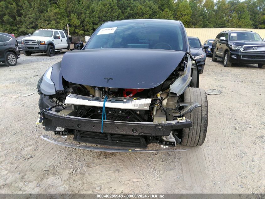 2023 Tesla Model Y VIN: 7SAYGDEF1PF596642 Lot: 40285948