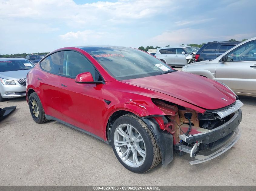 2023 Tesla Model Y Awd/Long Range Dual Motor All-Wheel Drive VIN: 7SAYGAEE7PF750146 Lot: 40287053