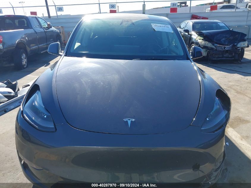 2023 Tesla Model Y Awd/Long Range Dual Motor All-Wheel Drive VIN: 7SAYGDEE8PF904509 Lot: 40287970