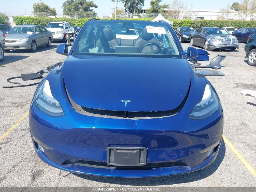 2021 Tesla Model Y Standard Range Rear-Wheel Drive VIN: 5YJYGDED7MF112903 Lot: 40288181