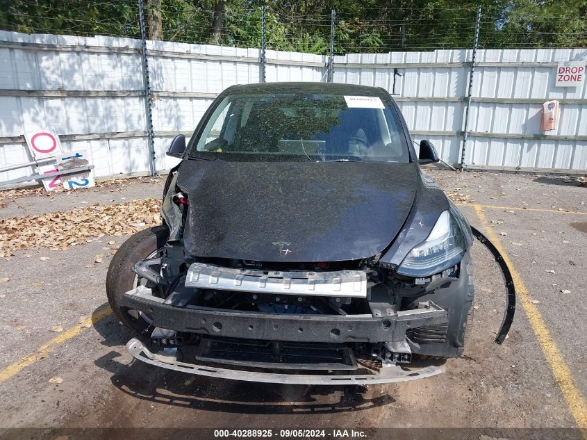 2023 Tesla Model Y Awd/Long Range Dual Motor All-Wheel Drive VIN: 7SAYGDEE9PA144569 Lot: 40288925