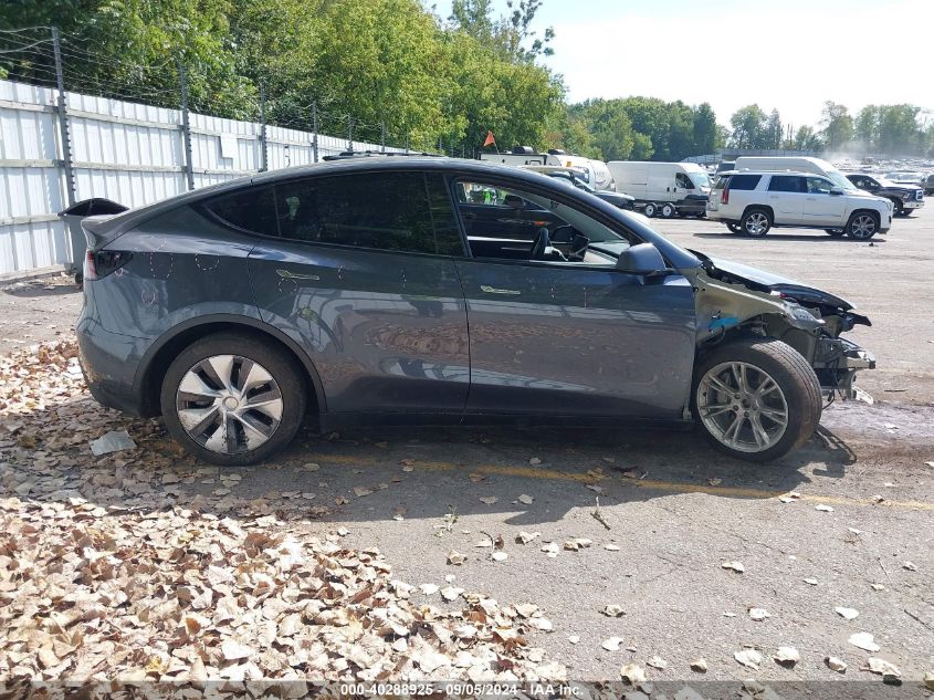 2023 Tesla Model Y Awd/Long Range Dual Motor All-Wheel Drive VIN: 7SAYGDEE9PA144569 Lot: 40288925