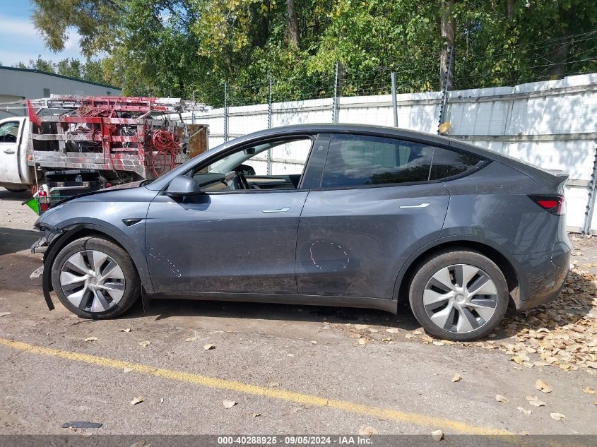 2023 Tesla Model Y Awd/Long Range Dual Motor All-Wheel Drive VIN: 7SAYGDEE9PA144569 Lot: 40288925