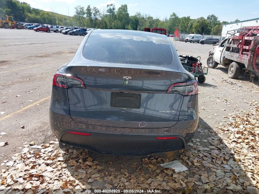 2023 Tesla Model Y Awd/Long Range Dual Motor All-Wheel Drive VIN: 7SAYGDEE9PA144569 Lot: 40288925