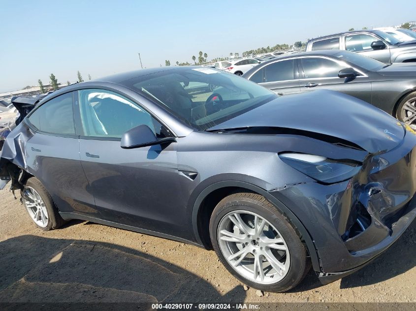 2023 Tesla Model Y Awd/Long Range Dual Motor All-Wheel Drive VIN: 7SAYGDEE2PF901850 Lot: 40290107