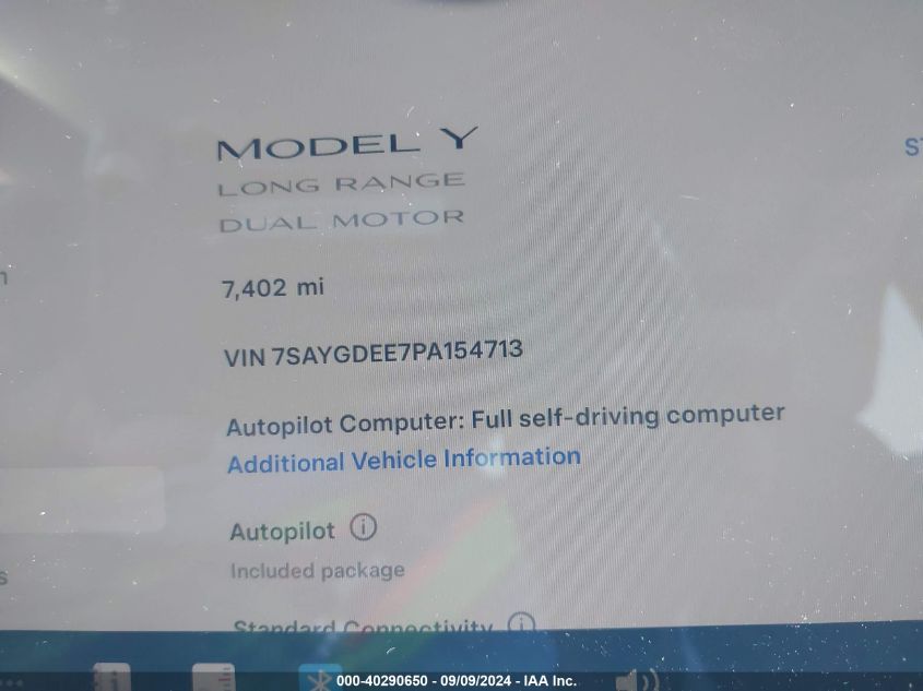 2023 Tesla Model Y Awd/Long Range Dual Motor All-Wheel Drive VIN: 7SAYGDEE7PA154713 Lot: 40290650