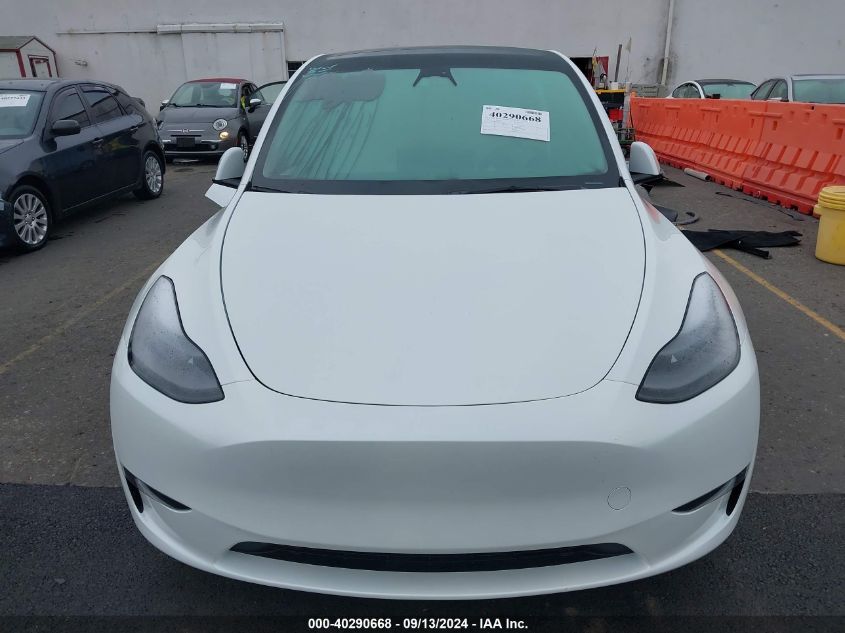 2023 Tesla Model Y Awd/Long Range Dual Motor All-Wheel Drive VIN: 7SAYGDEE3PF776129 Lot: 40290668