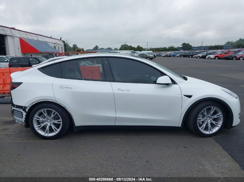 2023 Tesla Model Y Awd/Long Range Dual Motor All-Wheel Drive VIN: 7SAYGDEE3PF776129 Lot: 40290668