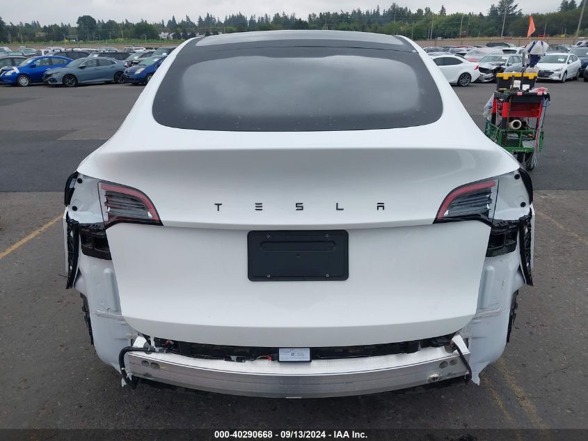 2023 Tesla Model Y Awd/Long Range Dual Motor All-Wheel Drive VIN: 7SAYGDEE3PF776129 Lot: 40290668