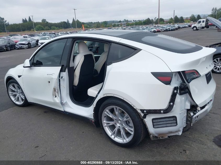 2023 Tesla Model Y Awd/Long Range Dual Motor All-Wheel Drive VIN: 7SAYGDEE3PF776129 Lot: 40290668