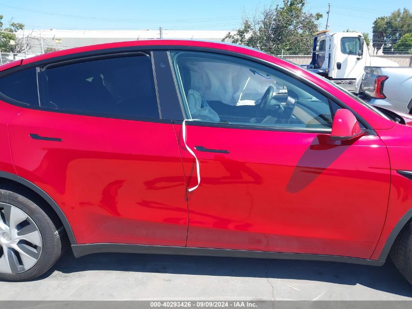 2023 Tesla Model Y Awd/Long Range Dual Motor All-Wheel Drive VIN: 7SAYGDEE2PA121182 Lot: 40293426