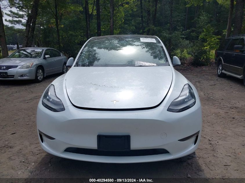 2023 Tesla Model Y VIN: 7SAYGDEE2PA104172 Lot: 40294580