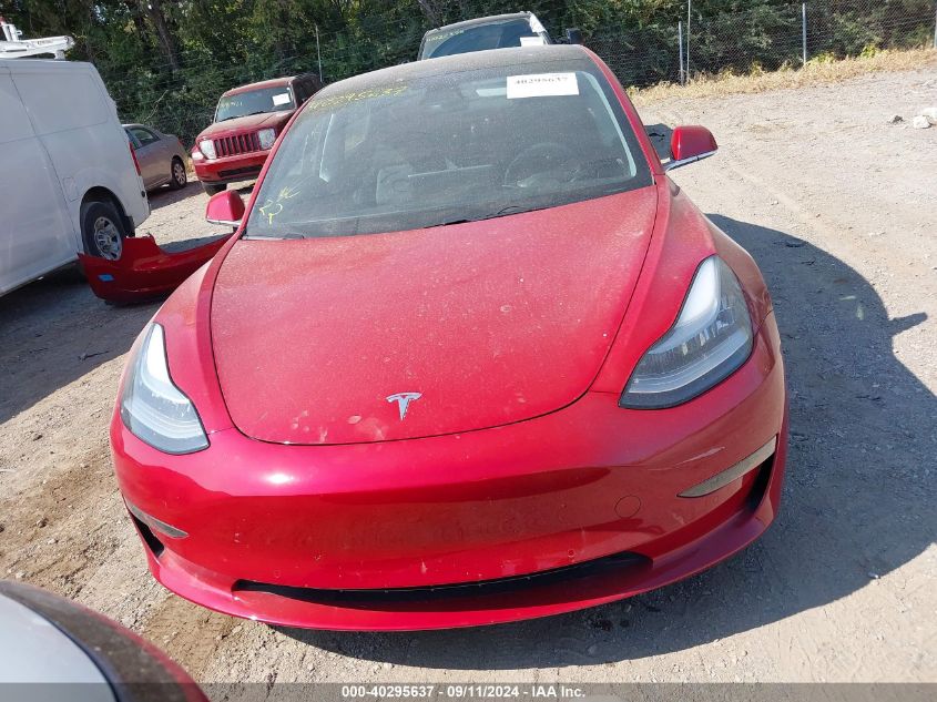 2018 Tesla Model 3 Long Range/Performance VIN: 5YJ3E1EB7JF065641 Lot: 40295637