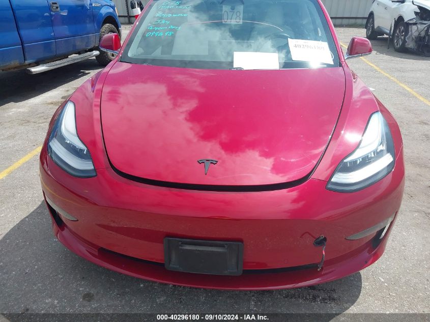 2018 Tesla Model 3 VIN: 5YJ3E1EB8JF099698 Lot: 40296180