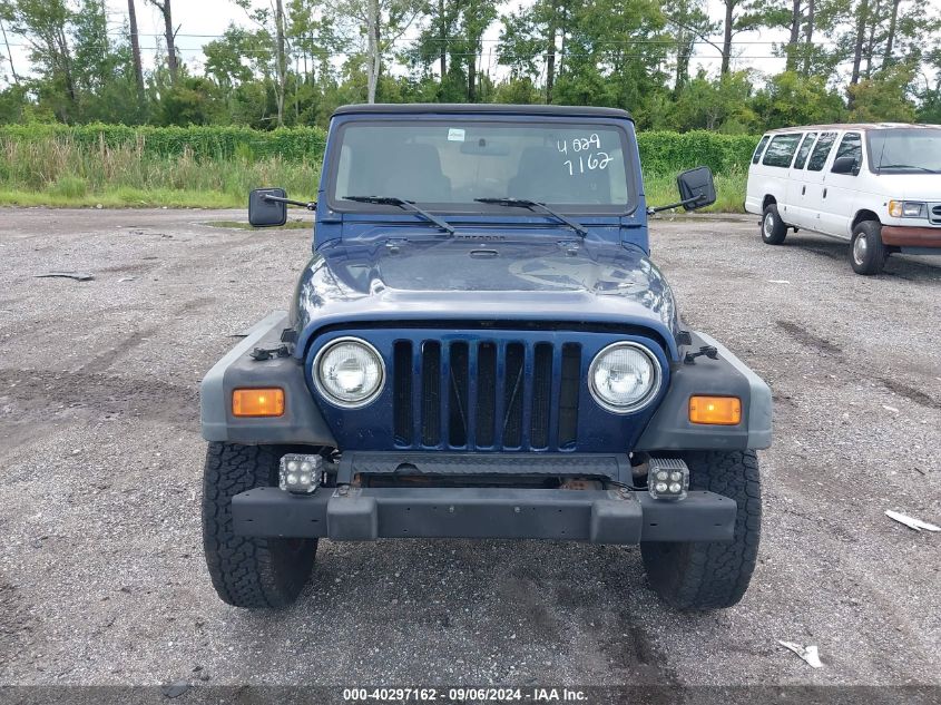 2004 Jeep Wrangler Se VIN: 1J4FA29134P735562 Lot: 40297162