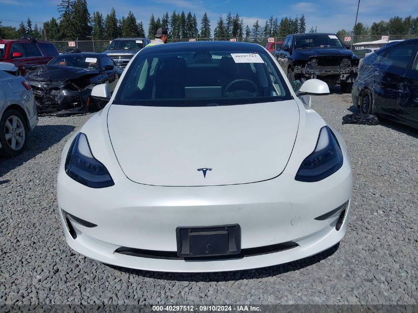 2021 Tesla Model 3 Standard Range Plus Rear-Wheel Drive VIN: 5YJ3E1EA5MF977437 Lot: 40297512