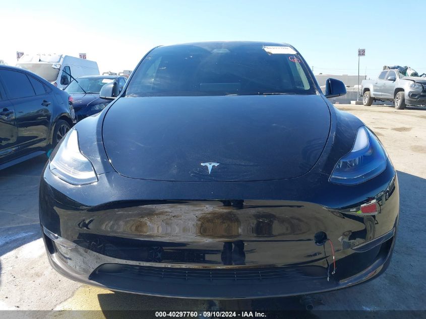 2024 Tesla Model Y VIN: 7SAYGDED9RF098321 Lot: 40297760