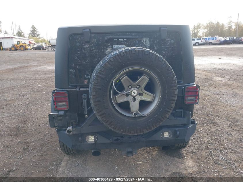 2011 Jeep Wrangler Sport VIN: 1J4AA2D14BL553018 Lot: 40300429