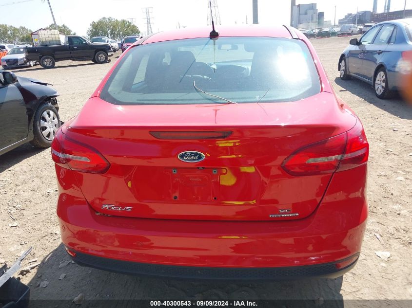 2015 Ford Focus Se VIN: 1FADP3F27FL351668 Lot: 40300543