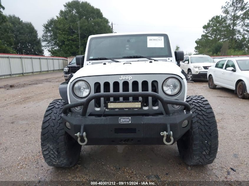 2015 Jeep Wrangler Unlimited Freedom Edition VIN: 1C4BJWDG5FL578599 Lot: 40301212