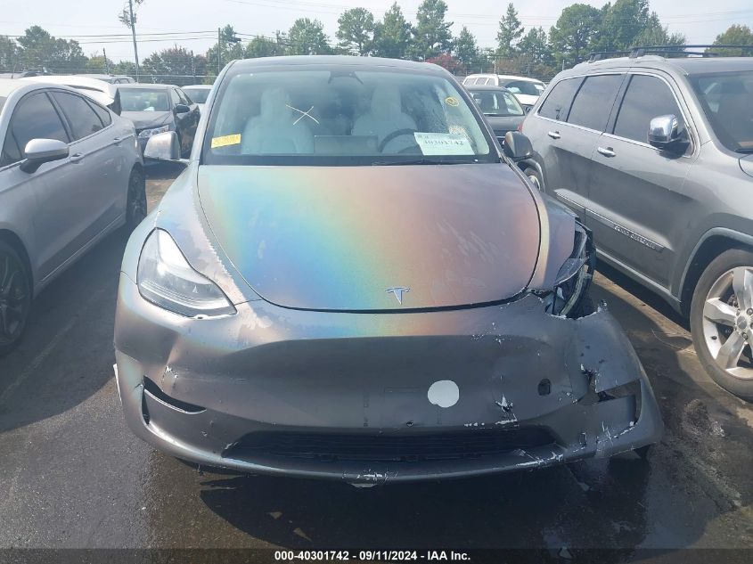 2023 Tesla Model Y VIN: 7SAYGDEE0PF671483 Lot: 40301742