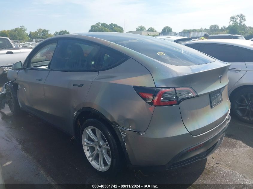 2023 Tesla Model Y VIN: 7SAYGDEE0PF671483 Lot: 40301742