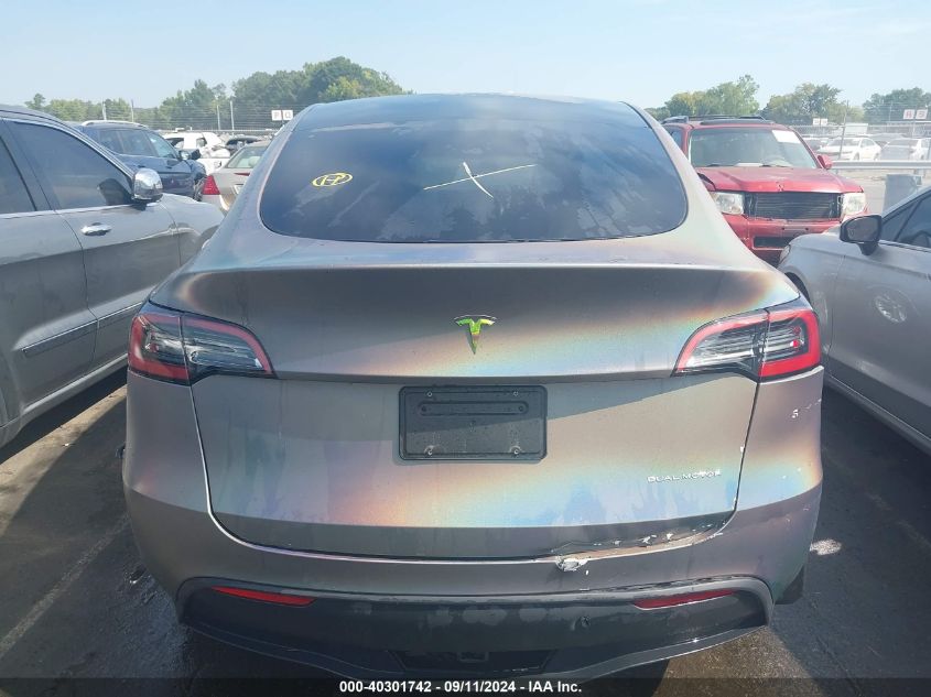 2023 Tesla Model Y VIN: 7SAYGDEE0PF671483 Lot: 40301742