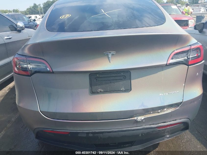 2023 Tesla Model Y VIN: 7SAYGDEE0PF671483 Lot: 40301742