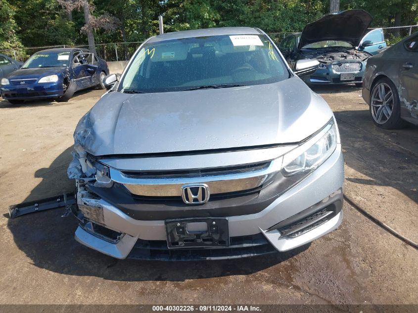 2018 Honda Civic Lx VIN: 2HGFC2F55JH517471 Lot: 40302226