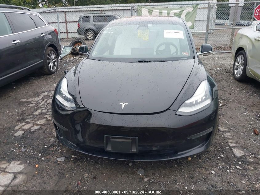 2018 Tesla Model 3 Long Range/Performance VIN: 5YJ3E1EB4JF097012 Lot: 40303001