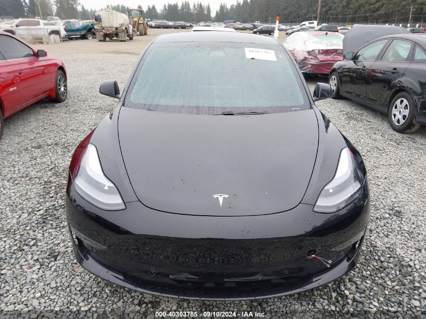 2021 Tesla Model 3 VIN: 5YJ3E1EAXMF066634 Lot: 40303785