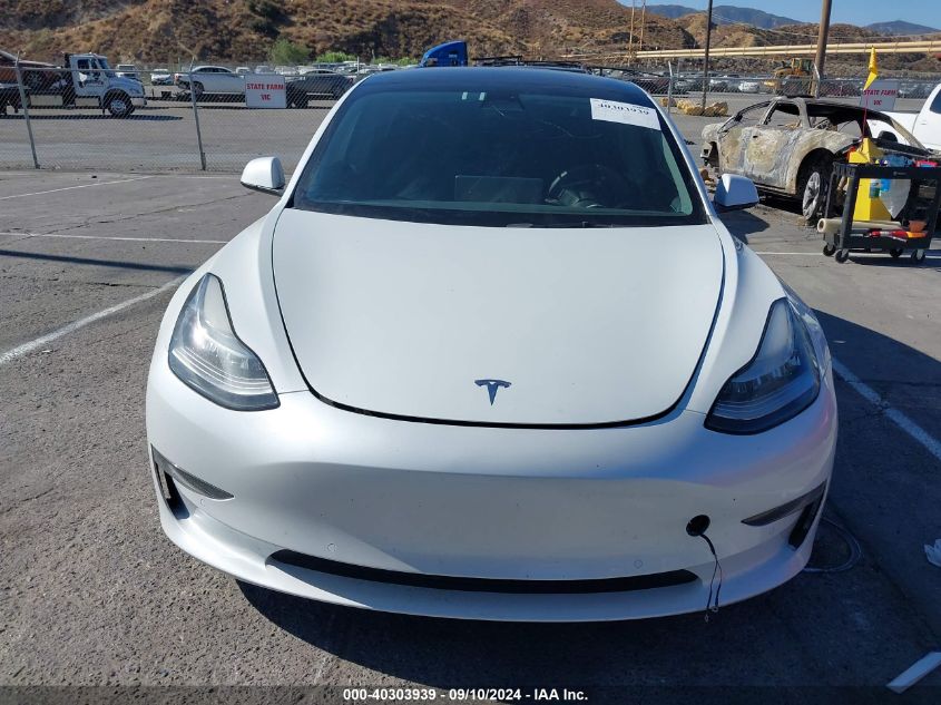 2022 Tesla Model 3 Long Range Dual Motor All-Wheel Drive VIN: 5YJ3E1EBXNF299634 Lot: 40303939