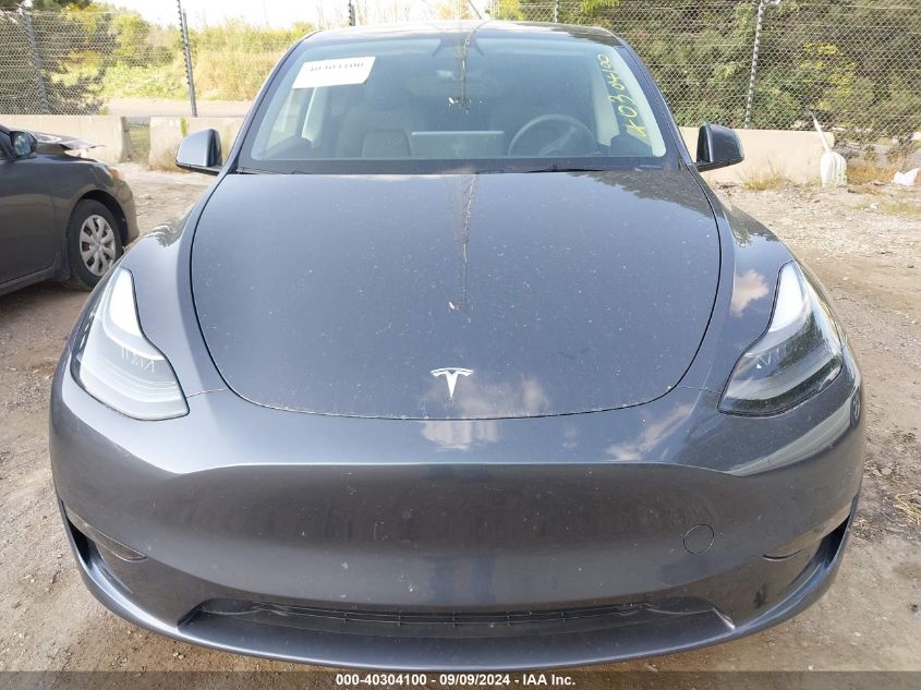 2023 Tesla Model Y Awd/Long Range Dual Motor All-Wheel Drive VIN: 7SAYGDEE8PF708067 Lot: 40304100