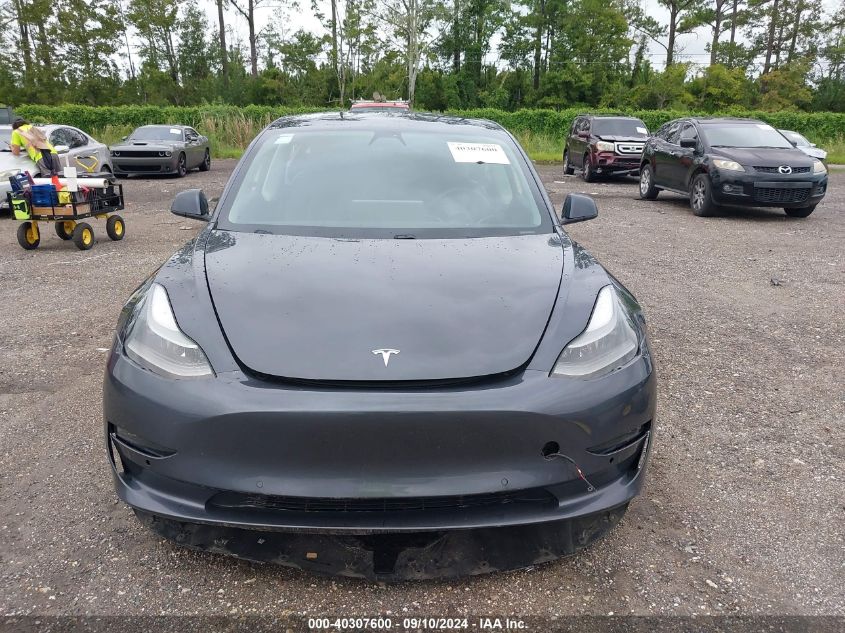 2021 Tesla Model 3 VIN: 5YJ3E1EB6MF869403 Lot: 40307600