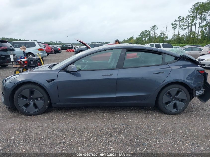 2021 Tesla Model 3 VIN: 5YJ3E1EB6MF869403 Lot: 40307600