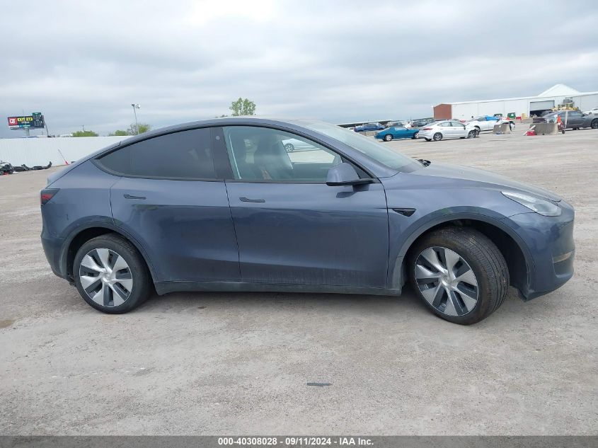 2023 Tesla Model Y Awd/Long Range Dual Motor All-Wheel Drive VIN: 7SAYGDEE8PA126564 Lot: 40308028