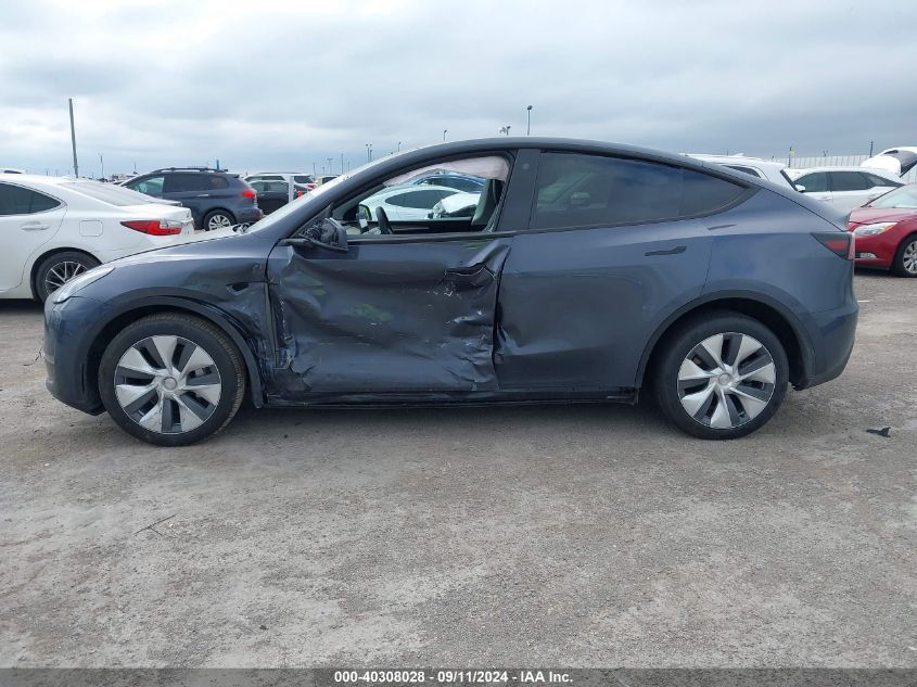 2023 Tesla Model Y Awd/Long Range Dual Motor All-Wheel Drive VIN: 7SAYGDEE8PA126564 Lot: 40308028