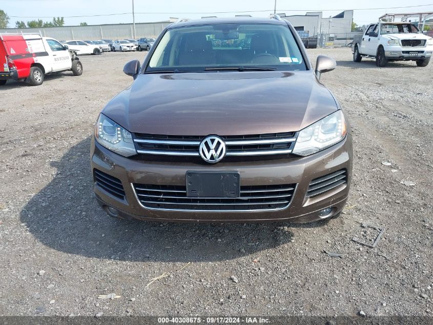 2014 Volkswagen Touareg Tdi Lux VIN: WVGEP9BP8ED008665 Lot: 40308675