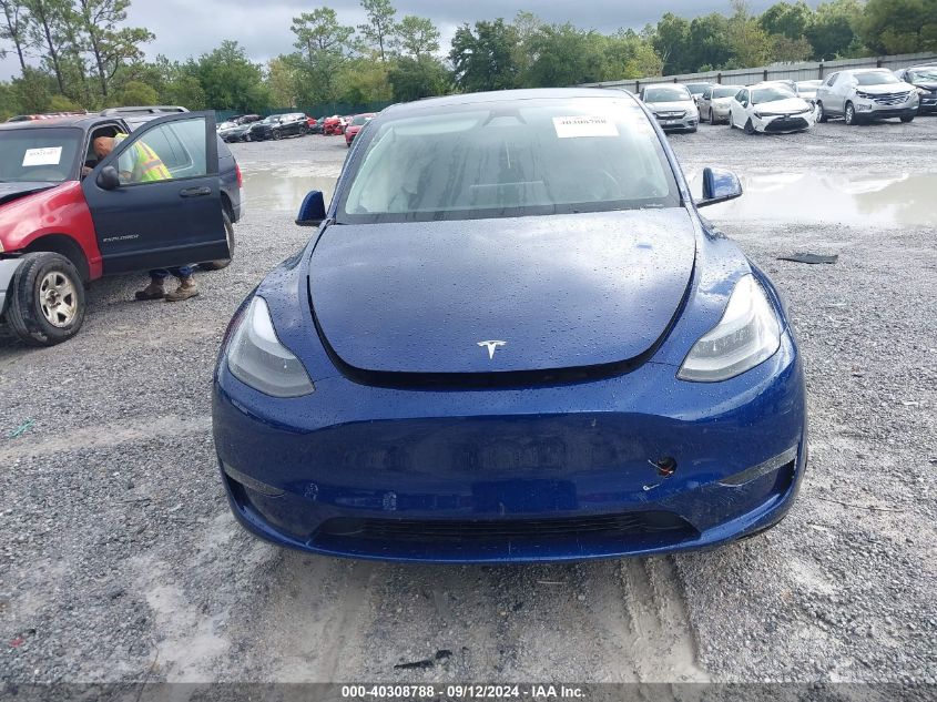 2024 Tesla Model Y VIN: 7SAYGDED6RF091083 Lot: 40308788