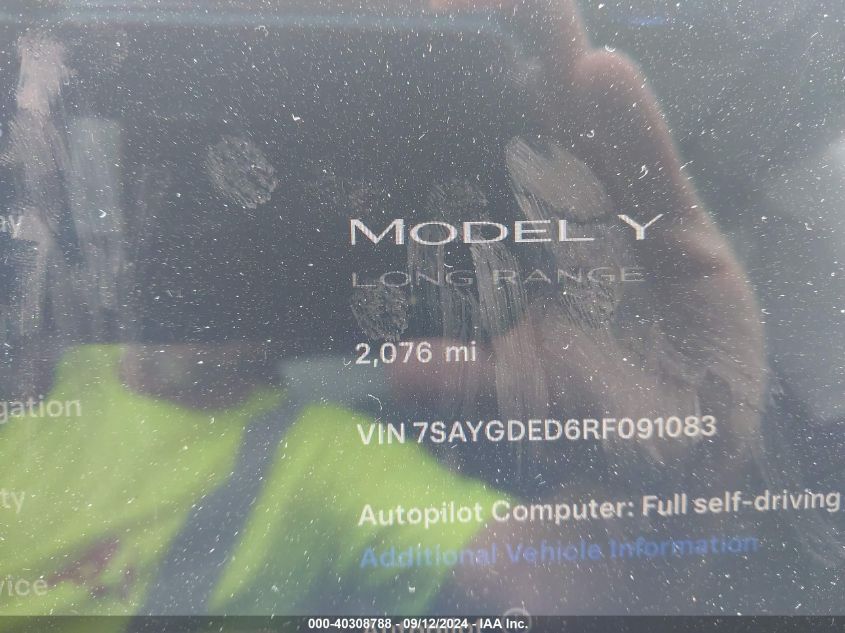 2024 Tesla Model Y VIN: 7SAYGDED6RF091083 Lot: 40308788